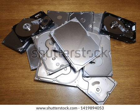 Stack of old hard drives - used hard disks