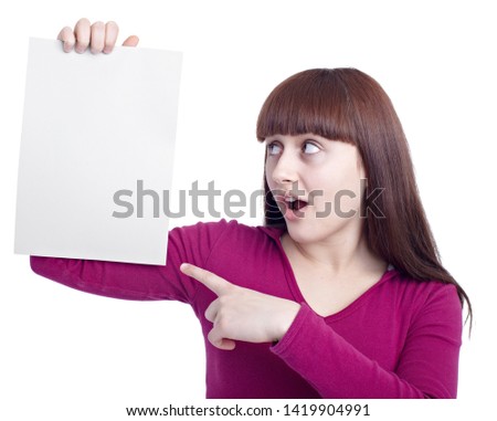 a teenage girl holding a blank sign