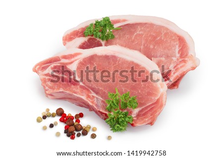 sliced raw pork meat with parsley and peppercorn isolated on white background Royalty-Free Stock Photo #1419942758