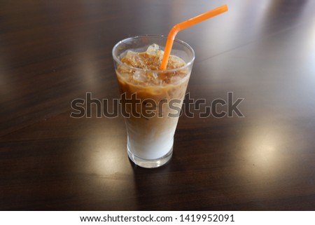 Ice cafe latte on table