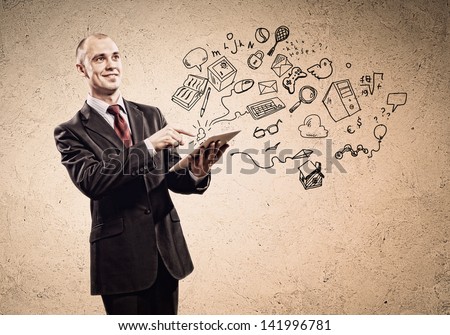 Image of businessman holding ipad. Collage drawings