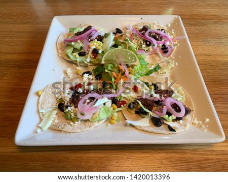 Steak street tacos with lime