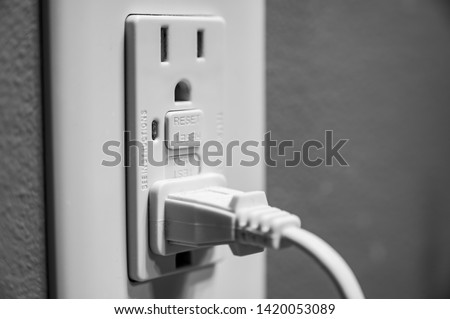 Tripped Ground Fault Interrupter Outlet Royalty-Free Stock Photo #1420053089
