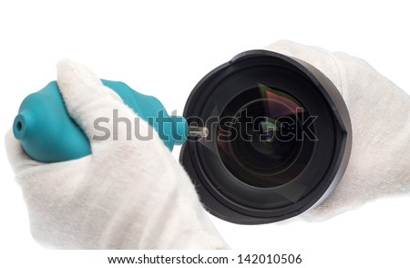 cleaning camera lens with a air blowing