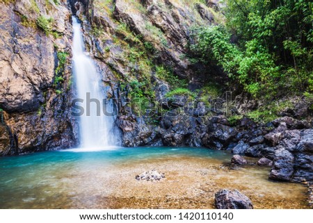 Natural background Landscape photo jogkradin in the deep forest at Kanchanaburi in Thailand. Emerald waterfall, travel nature, Travel relax, Travel  Thailand, Waterfall picture, Landscape photo.