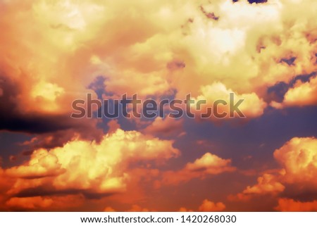 Dramatic sunset in the sky. Vivid abstract natural background. Orange sky