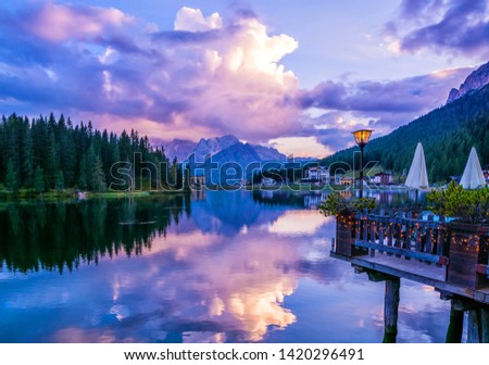 Amazing nature view of Misurina Lake and mountain range during a beautiful sunset. Location: Lake Misurina, Dolomites Alps, South Tyrol, Italy, Europe. Artistic picture. Beauty world. Nature Landscape