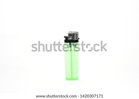 Green plastic gas lighter isolated on white background, Closeup shot