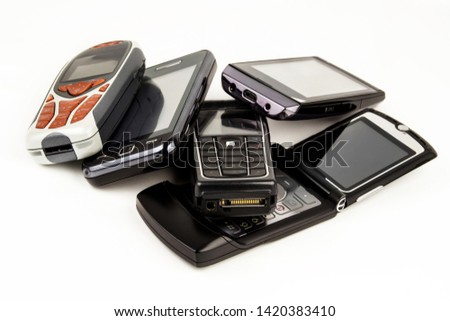 Different  mobile phones  against a white background