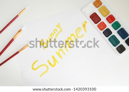 Stationery for drawing paints on a white sheet of paper
