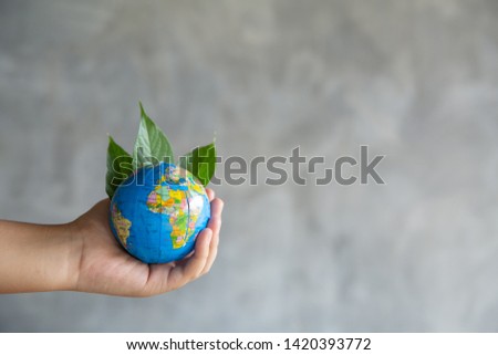 Environment Concept. Green Planet in Your Hands. Save Earth. 