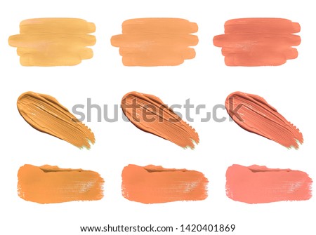 Face foundation, concealer or liquid lipstick smears isolated on white background. Lip gloss and lipstick smears. Makeup swatches. Cosmetic product strokes. Acrylic paint smeared texture. 