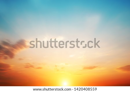 Blur pastels gradient sunset background on soft nature sunrise peaceful morning beach outdoor. heavenly mind view at a resort deck touching sunshine, sky summer clouds. Royalty-Free Stock Photo #1420408559