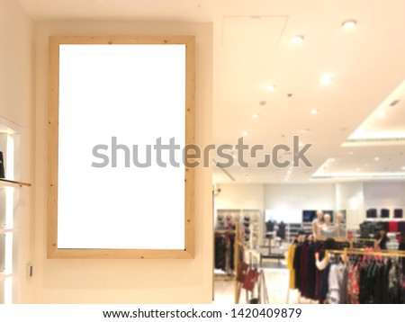 Advertisement space mock up inside a  retail store at a shopping mall. This is ideal for digital signage, large poster and video wall ads