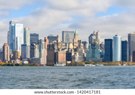 New York city over the hudson river in the morning with blue sky and cloudy.