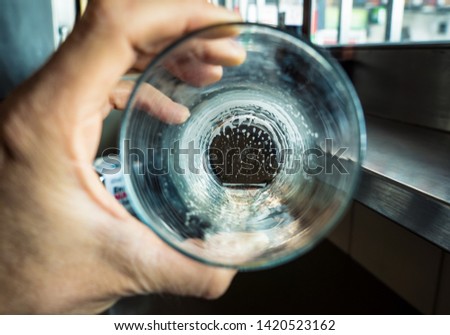 Conceptual picture of a empty beer glass in alcoholism idea and emptiness of drug abuse life