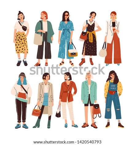 Collection of stylish young women dressed in trendy clothes. Set of fashionable casual and formal outfits. Bundle of cute girl hipsters or trendsetters. Flat cartoon colorful vector illustration. Royalty-Free Stock Photo #1420540793