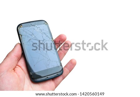 Broken smartphone in hand isolated on white background.