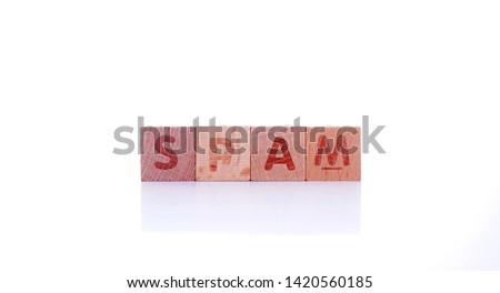 wooden cube with word spam on white background. Concept image