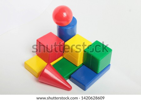 colored childrens cubes on a white background
