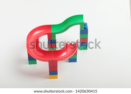 colored childrens cubes on a white background
