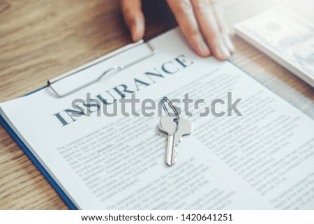 Sale agent and customer sign agreement contract, Insurance Home concept