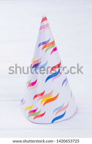 Festive paper hat for kids Birthday party. Cardboard party hat with beautiful design. DIY crafts for children.