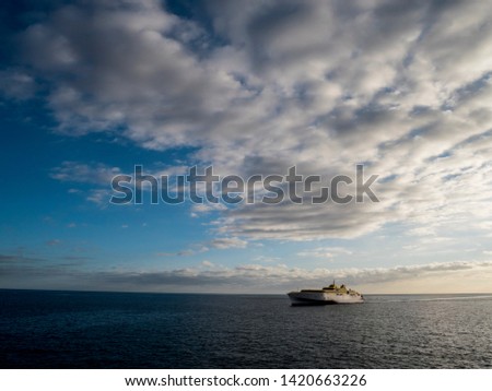 Fast ferry ship. Sunny summer day on Tenerife iceland. Royalty-Free Stock Photo #1420663226