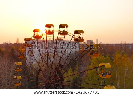 Views of the city of Pripyat near the Chernobyl nuclear power plant, aerial view. The main square of the abandoned city Pripyat at sunset. Royalty-Free Stock Photo #1420677731