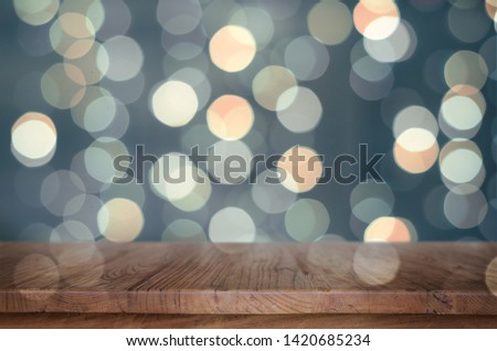 Nice bokeh background with a wooden table surface.