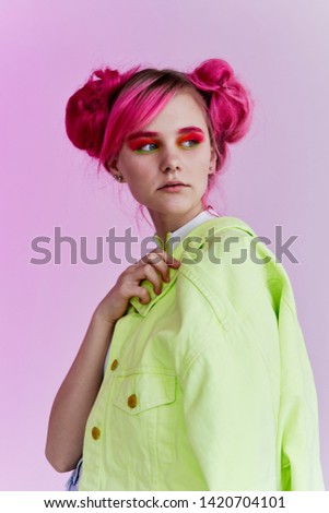 woman with pink elephants bright makeup