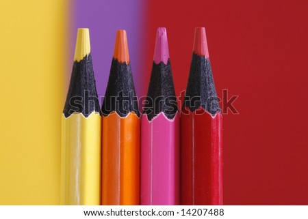 a part of  pencils with a simple  colorful background