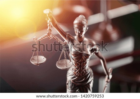 Law and justice concept. Judge's gavel, scales, hourglass, vintage clock, books.
    
