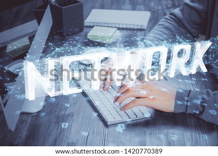Double exposure of tech drawings with hands working on computer background. Concept of innovation.