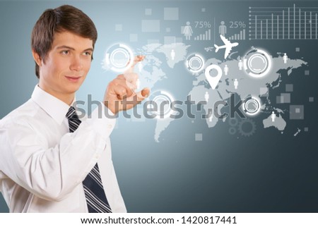 Businessman and internet and virtual reality concept - businessman pressing button on virtual screens