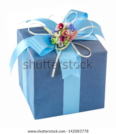 Close up blue gift box with bow tie and colorful flowers isolated on white