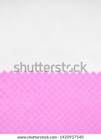 Background texture of pink mosaic on white wall.