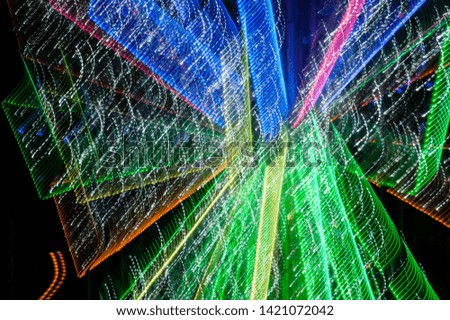 Light painting abstract background. Abstract blurred of Light LED painting effects on black background. Festival decoration. Colorful. Free space for any text design.