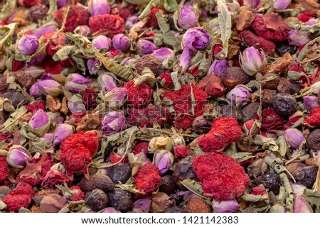 Dried flowers of pomegranate and orange. Closeup picture