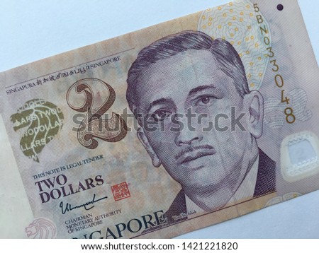 Singapore banknote isolated on the white background.