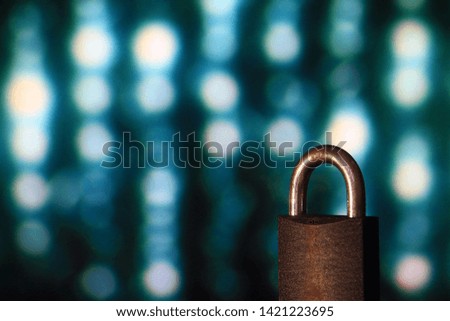 Padlock closed. padlock placed in front of circular defocus bokeh light. digital computer and internet theme security concepts. cyber security and virus protection.