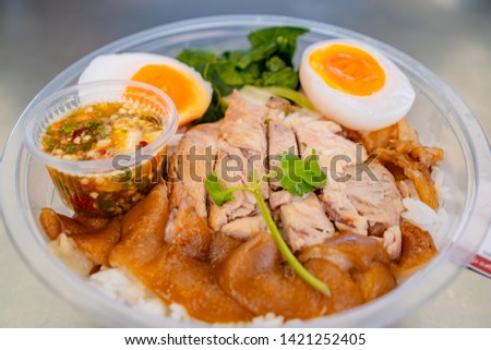 Kao Ka Moo Thai food,Thai Pork Leg Top view of stewed pork leg and boiled egg on rice