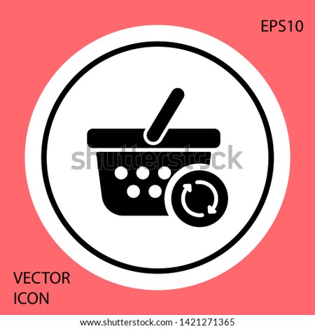 Black Refresh shopping basket icon isolated on red background. Online buying concept. Delivery service sign. Update supermarket basket symbol. White circle button. Vector Illustration