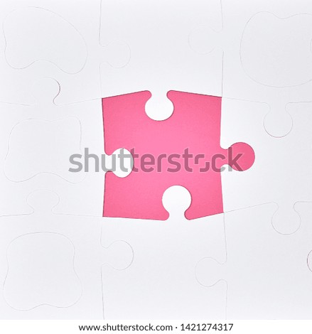 white large blank puzzles on a pink background, top view, copy space