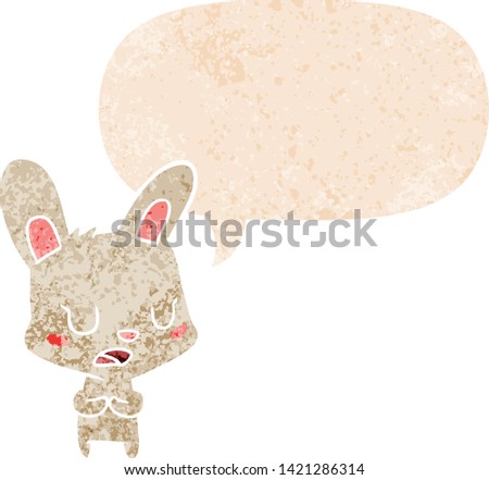 cartoon rabbit talking with speech bubble in grunge distressed retro textured style