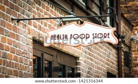 Street Sign the Direction Way to HEALTH FOOD STORE