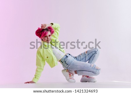 woman with pink hair retro style jeans jacket