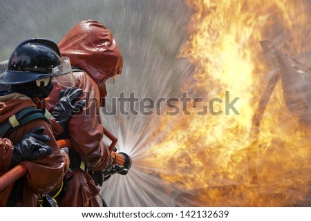 Firefighter fighting For A Fire Attack, During A Training