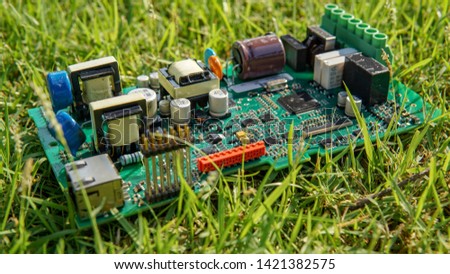 Electronic board on the lawn - Image