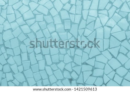 Broken tiles mosaic seamless pattern. Blue tile real wall high resolution real photo or brick seamless with texture interior background. Abstract wallpaper irregular in bathroom.